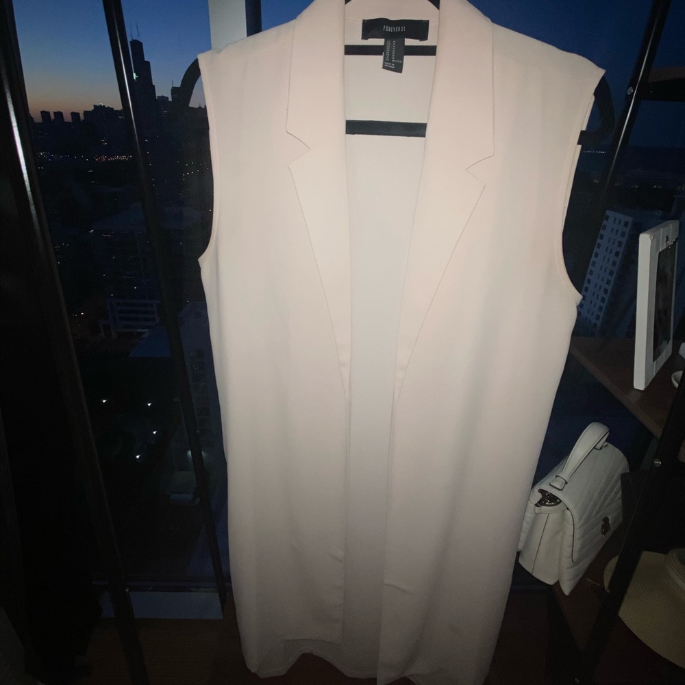 Sleeveless long blazer